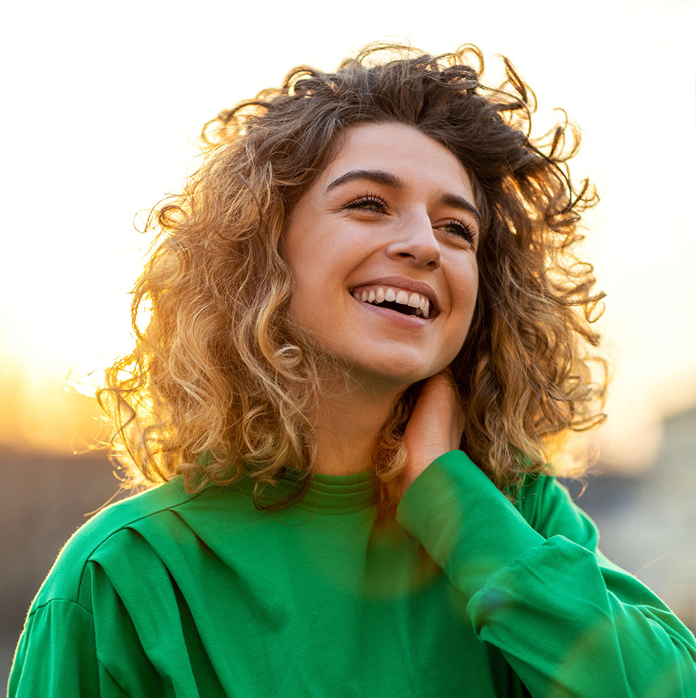 The image shows a modern dental or medical office interior with a dental chair, equipment, and a clean, professional environment.
